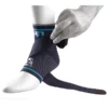 Adjustable cross-over strap, breathable, compressive 4-way stretch of the material