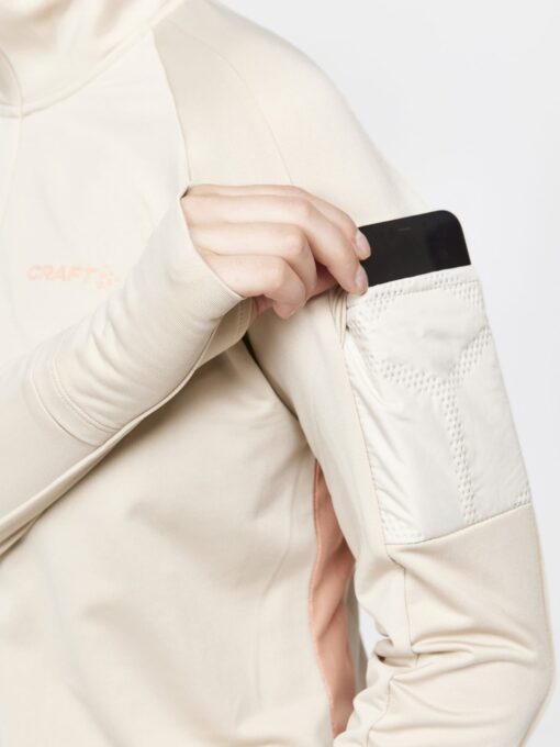 1911315-211716_ADV SubZ LS W_Closeup3 CRAFT ADV SubZ Long Sleeve Womens pocket closeup peach