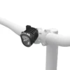 SILVA Exceed 4X headlamp main with battery beside-product fixed on the bike