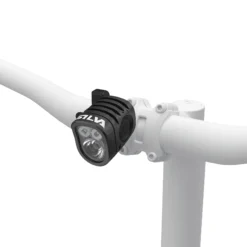 SILVA Exceed 4X headlamp main with battery beside-product fixed on the bike