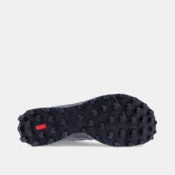 INOV8 Mudtalon V2 outsole showing aggressive trail grip - colour black