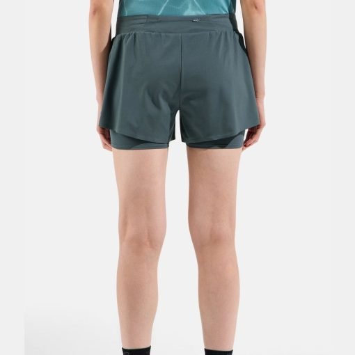 ODLO women's 2-in-1 running shorts back view on a model