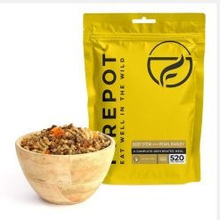 lightweight dehydrated Firepot Beef Stew with Pearl Barley pouch beside a serving of beef stew.